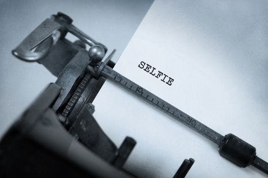 Close-up of a vintage typewriter, old and rusty, selfie