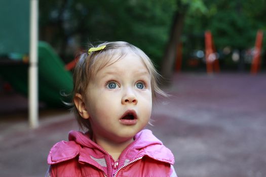 Portrait of a surprised little girl