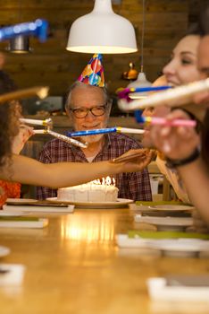 Big family celebrate the birthday of the grandfather