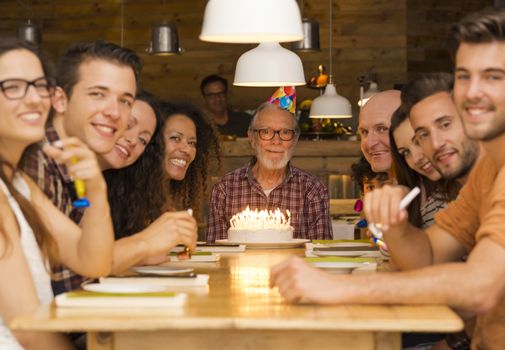 Big family celebrate the birthday of the grandfather