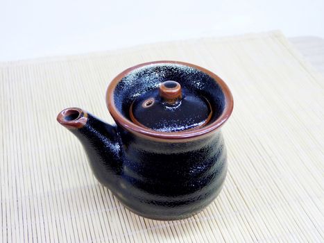 Sauce-boat for a land with a cover from a collection of ceramic Japanese ware	
