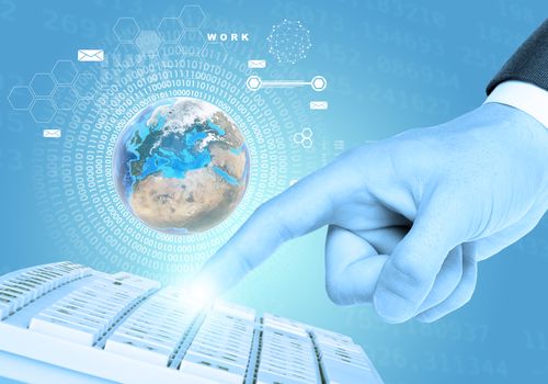 Businessmans finger touching keyboard on abstract blue background. Elements of this image furnished by NASA