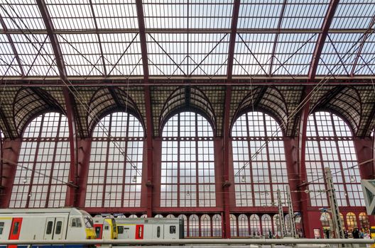 Antwerp, Belgium - May 11, 2015: People in Antwerp Central station on May 11, 2015 in Antwerp, Belgium. The station is now widely regarded as the finest example of railway architecture in Belgium.