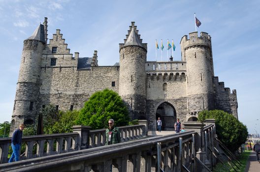 Antwerp, Belgium - May 11, 2015: People visit Steen Castle (Het steen) on May 11, 2015. Het Steen is a medieval fortress in the old city centre of Antwerp, Belgium.