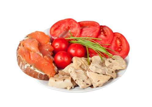 Fish, meat and tomatoes, correct balanced meal for athletes. Isolated on white. side view