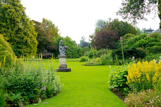 big english garden with borders and flowers