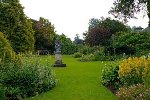 big english garden with borders and flowers