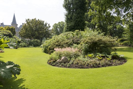 bid park with grass and flowers plants and borders