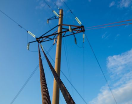 power transmission tower on blue sky background