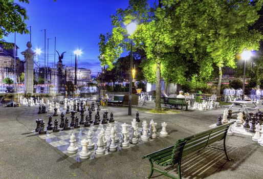 Outdoor chessgame, Bastions park by night in Geneva, Switzerland, HDR