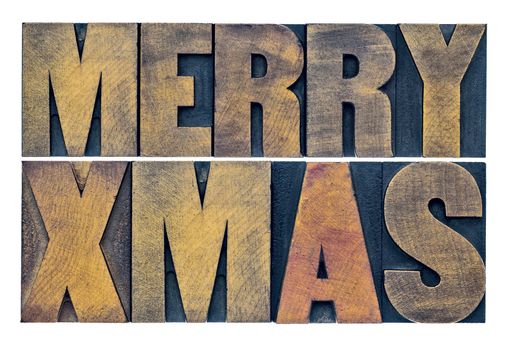 Merry Xmas (Christmas) greetings or wishes - isolated text in vintage grunge letterpress wood type blocks