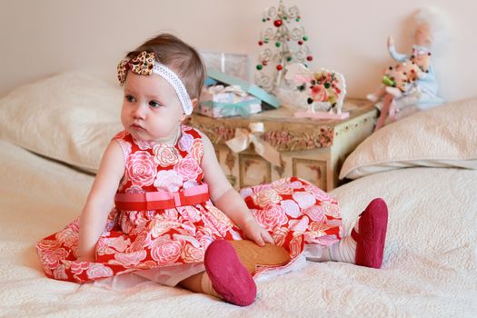 Portrait of little girl with a gifts