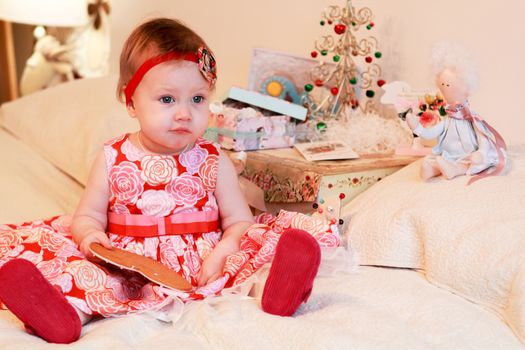 Portrait of little girl with a gifts