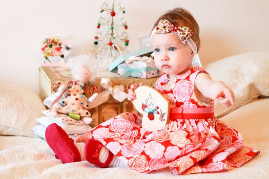 Portrait of little girl with a gifts