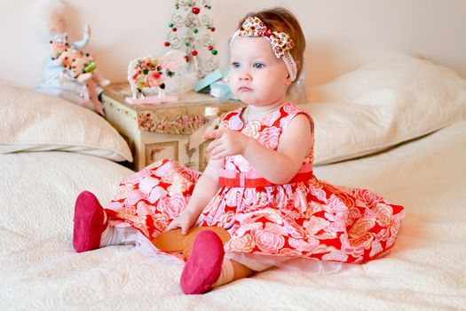 Portrait of little girl with a gifts