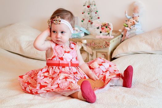 Portrait of little girl with a gifts