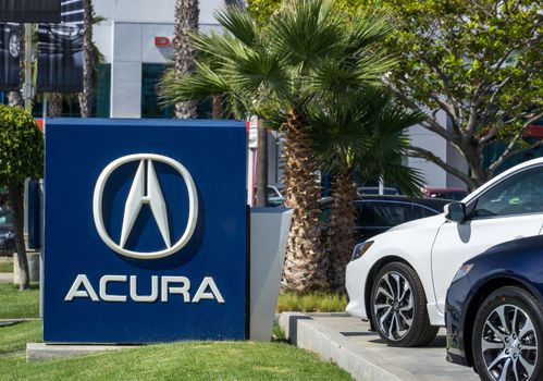 LOS ANGELES, CA/USA - JULY 11, 2015: Acura automobile dealership sign and logo. Acura is the luxury vehicle division of Japanese automaker Honda.