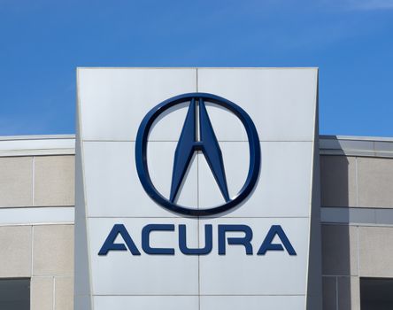 LOS ANGELES, CA/USA - JULY 11, 2015: Acura automobile dealership sign and logo. Acura is the luxury vehicle division of Japanese automaker Honda.