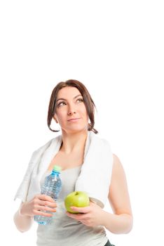 beautiful girl in a gray t-shirt with an apple