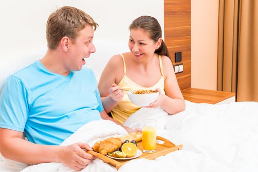 woman and man in a cheerful breakfast