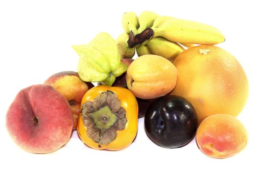 Various fresh fruits on a light background