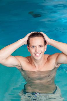 Happy man swimming