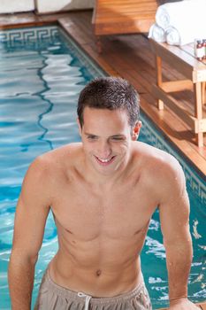 Man coming out of the pool