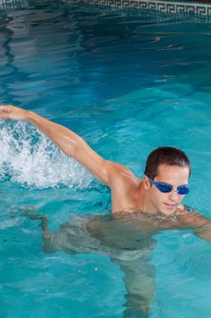 Man swimming with goggles