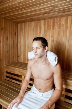 Guy relaxed inside the sauna