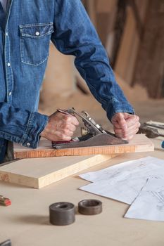 Carpenter working in his workshop