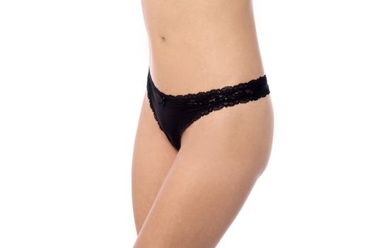 Cropped mid section image of woman in lingerie