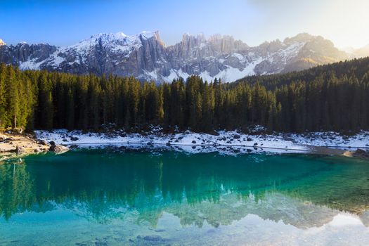 Lago di Carezza (Karersee) with Alps and blue skies, Sudtirol, Italy