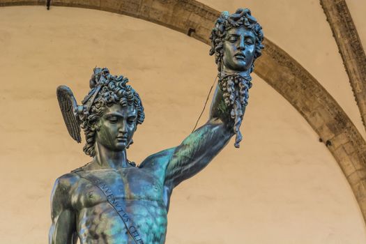 The Benvenuto Cellini bronze statue of Perseo hanging the head of Medusa in the Lanzis Loggia in Florence