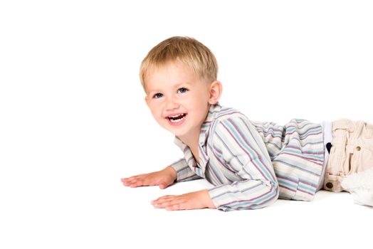 Boy in shirt shot in the studio on a white background