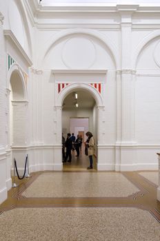 Amsterdam, Netherlands - May 6, 2015: People visit Stedelijk Museum in Amsterdam located in the museum park, Netherlands on May 6, 2015