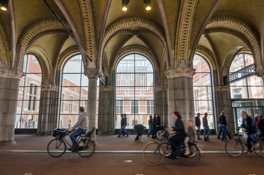 Amsterdam, Netherlands - May 6, 2015: People at main entrance of the Rijksmuseum passage on May 6, 2015. Rijksmuseum is a Netherlands national museum dedicated to arts and history in Amsterdam.