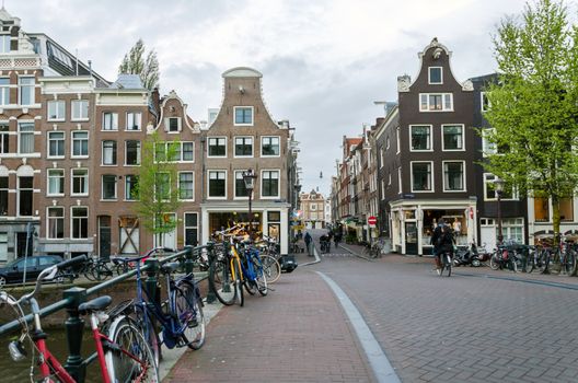 Amsterdam, Netherlands - May 7, 2015: Dutch People in the city of Amsterdam on May 7, 2015. Amsterdam is the capital and most populous city of the Netherlands.