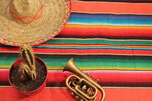 striped poncho serape fiesta background with copyspace