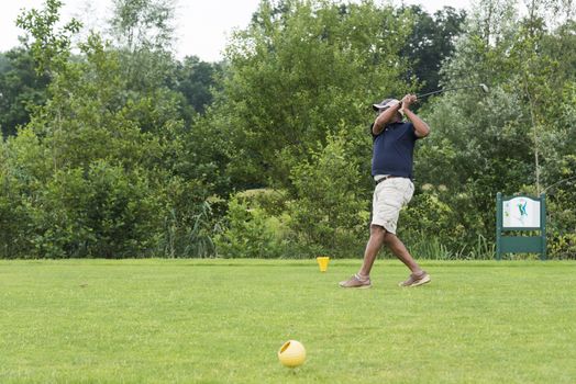 DELDEN,HOLLAND- JULI 5:Unidentified golfer participate in open golf tournement on Juli 5 2015 in Delden Holland, this game is held once a year