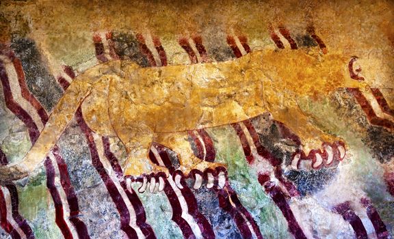 Ancient Jaguar Colorful Painting Mural Wall Indian Ruins at Teotihuacan Mexico City Mexico.  Avenue of Deadi.  Ancient ruins date back to 100 to 750AD.


