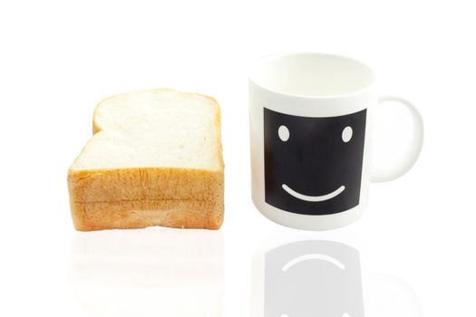 Empty smile coffee cup or smile coffee mug and sliced bread isolated on white background