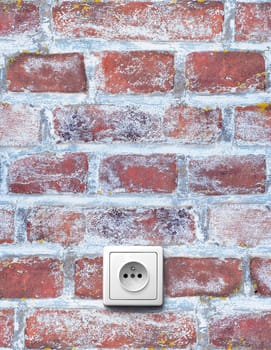 old red brick wall with electrical outlet
