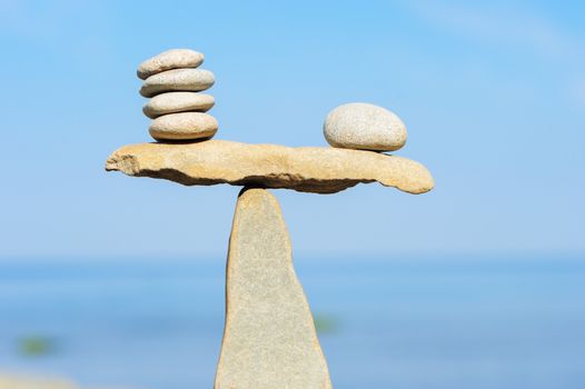 Well-balanced of pebbles on the top of stone