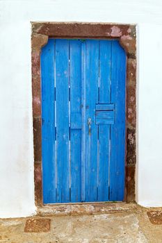 Traditional Greek blue door on Santorini island, Greece