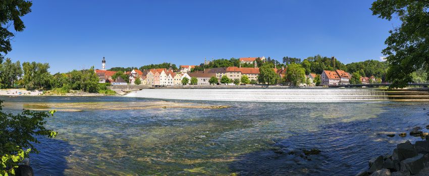 Panoramic view of the town of Landsberg with the famous river Lech waterfall Karolinenwehr in Bavaria, Germany