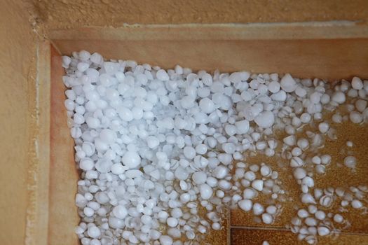pile of hail on the floor balcony