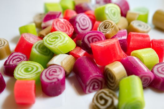 Colorful candies on white background