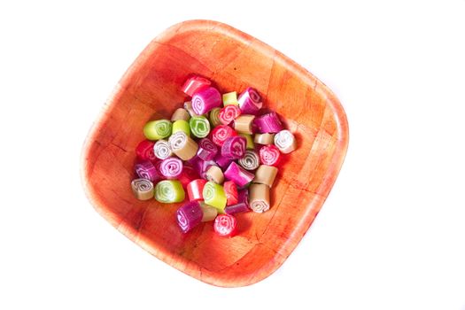 Colorful candies on white background