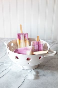 Frozen berry yogurt popsicles for summer