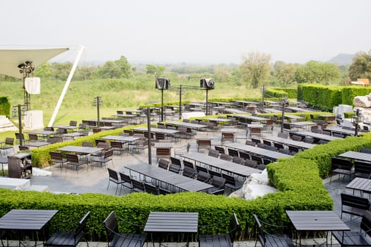 Outdoor Table and chairs in empty restaurant